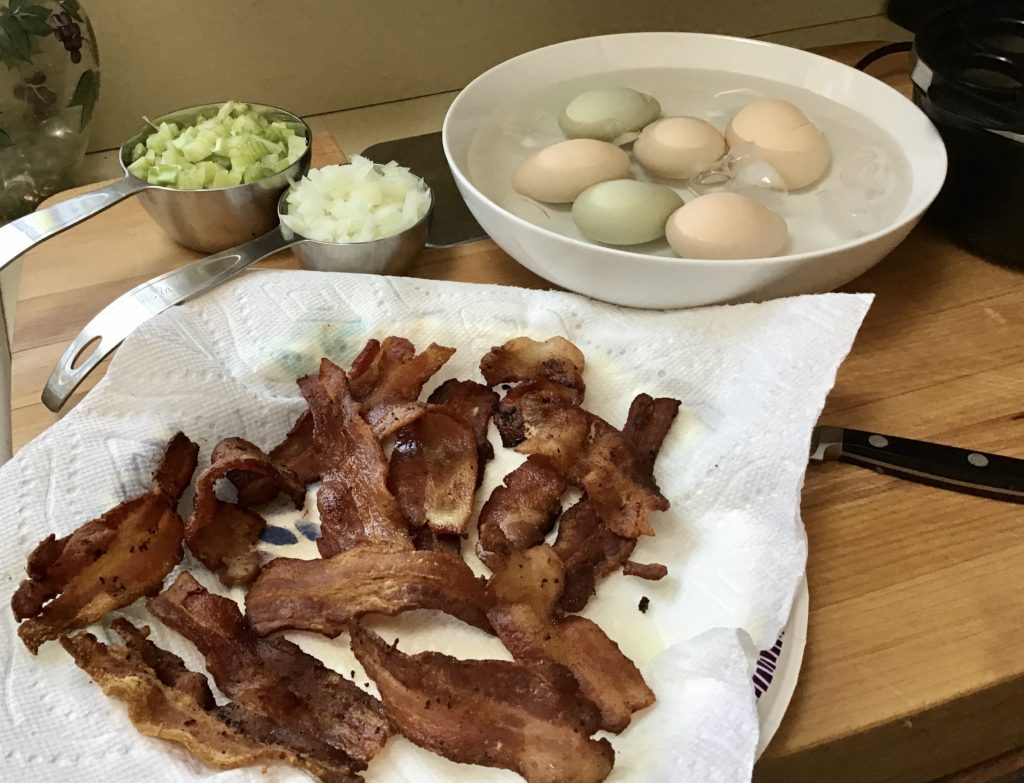 Potato salad with egg and bacon