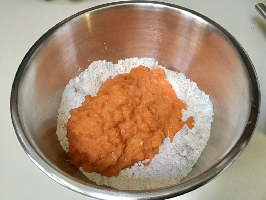 Add carrots to dry mixture for carrot cake recipe
